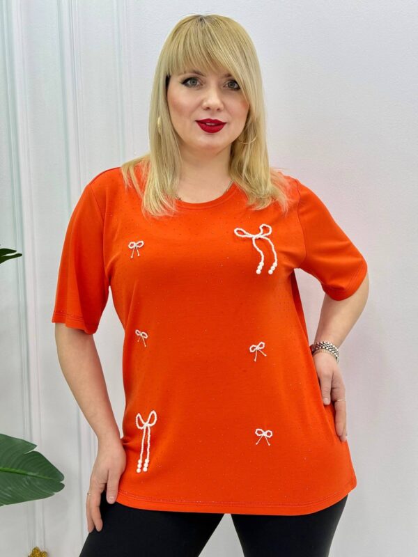 file_1734-1.jpg Elegant Orange Blouse with Pearl Bow Embellishments