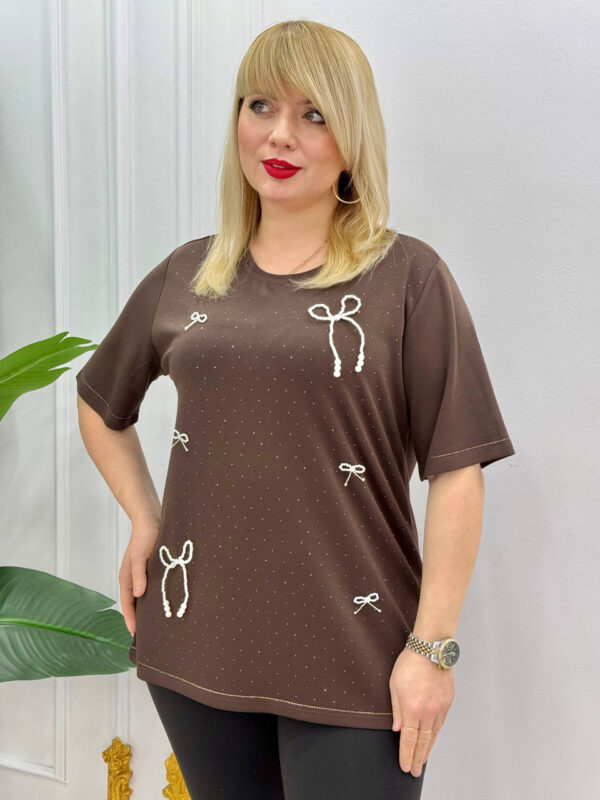 file_1736.jpg Elegant Orange Blouse with Pearl Bow Embellishments