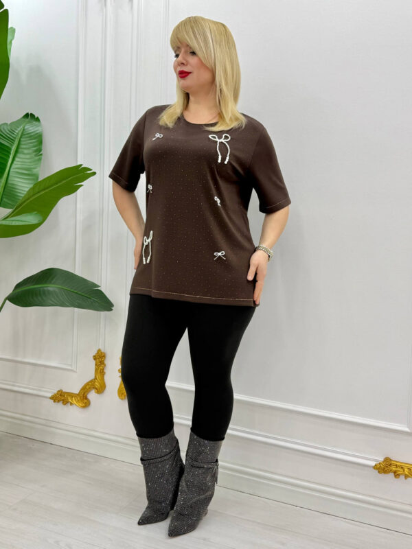 file_1737.jpg Elegant Orange Blouse with Pearl Bow Embellishments