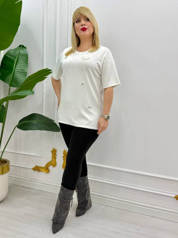 file_1741.jpg Elegant Orange Blouse with Pearl Bow Embellishments