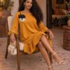 Ruffle Hem Tunic Dress with Floral Appliqué